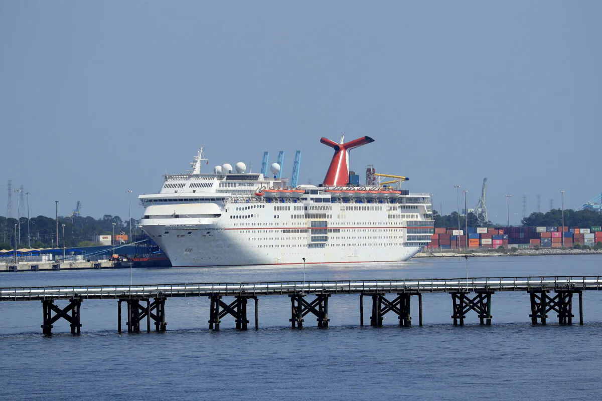 Carnival Cruise Line's Carnival Ecstacy cruise ship is docked at the Port of Jacksonville amid the CCP virus outbreak in Jacksonville, Florida, on March 27, 2020. (Greenwood/Getty Images)