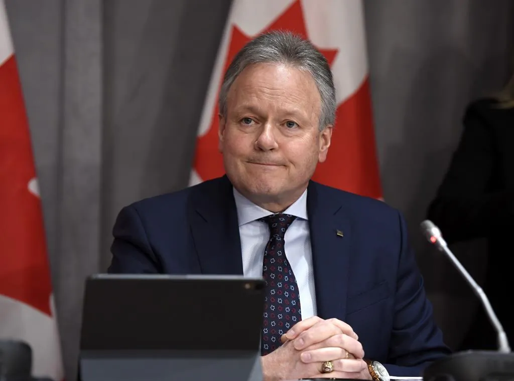 Governor of the Bank of Canada Stephen Poloz listens to a question at a press conference on Parliament Hill in Ottawa, on Wednesday, March 18, 2020. Canada's central bank will make an announcement today on its key interest rate and detail the impact of COVID-19 on the national economy. (Justin Tang/The Canadian Press)
