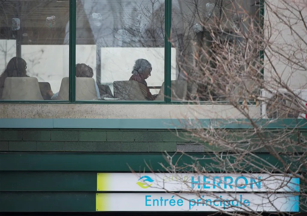 People are shown inside Maison Herron, a long term care home in the Montreal suburb of Dorval, Que., on Saturday, April 11, 2020, as COVID-19 cases rise in Canada and around the world. (Graham Hughes/The Canadian Press)
