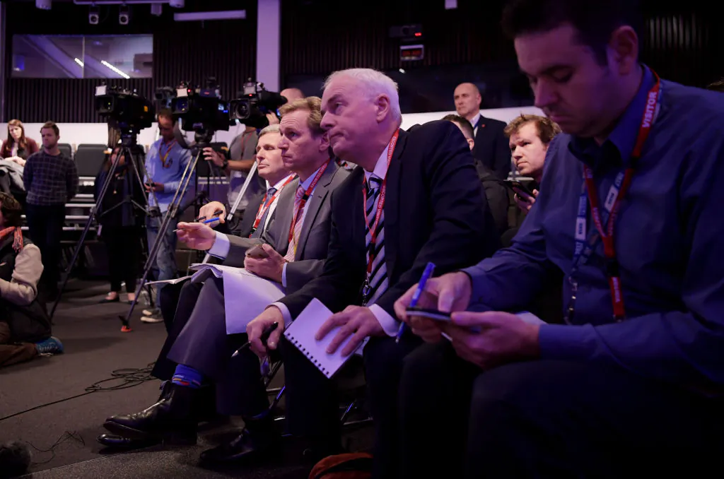 CANBERRA, AUSTRALIA - JUNE 06: Journalists and reporters listen to Acting AFP Commissioner Neil Gaughan speak to the media on June 06, 2019 in Canberra, Australia. (Photo by Getty Images)