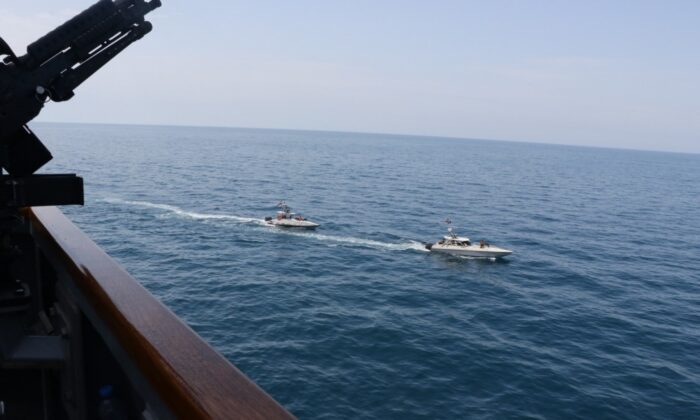 Iranian Islamic Revolutionary Guard Corps Navy (IRGCN) vessels cross U.S. ships’ bows and sterns at close range while operating in international waters of the North Arabian Gulf on April 15, 2020. (U.S. Navy photo)