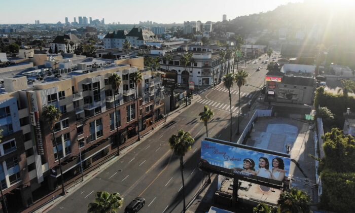 An aerial view shows light traffic passing on Sunset Boulevard during what would normally be the evening rush hour, in the midst of the coronavirus pandemic, in Los Angeles, on April 15, 2020. (Mario Tama/Getty Images)