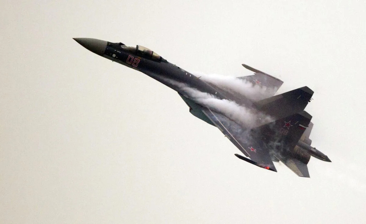A Sukhoi SU-35 fighter jet performs during a test flight ahead of the Airshow China 2014 in Zhuhai, Guangdong Province, China, on Nov. 10, 2014.  (Johannes Eisele/AFP via Getty Images)