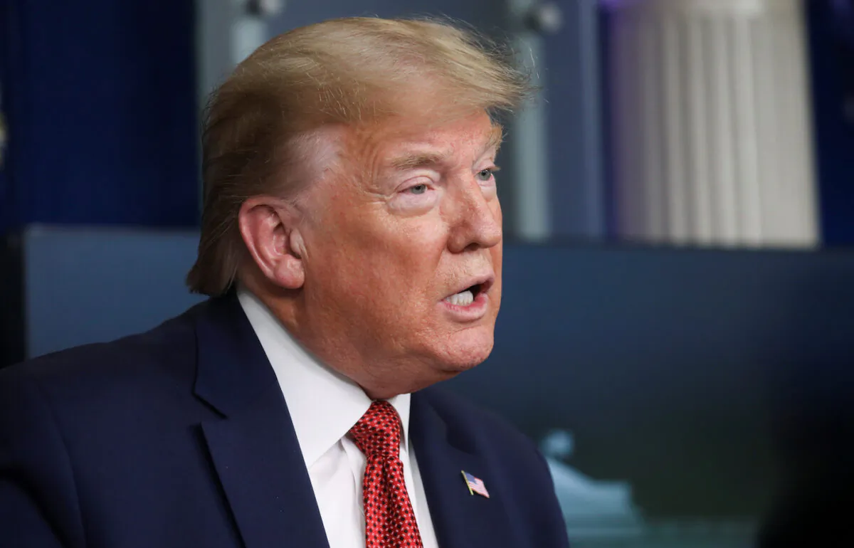 President Donald Trump announces guidelines for "Opening Up America Again" as he addresses the daily coronavirus task force briefing at the White House in Washington on April 16, 2020. (Leah Millis/REUTERS)