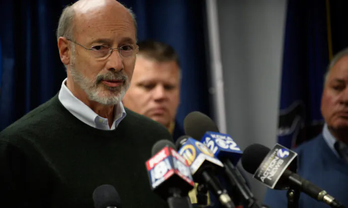 Pennsylvania Gov. Tom Wolf speaks to reporters in Pittsburgh in a file photograph. (Jeff Swensen/Getty Images)