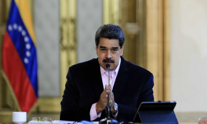 Venezuelan President Nicolas Maduro speaks during a televised announcement at Miraflores Presidential Palace in Caracas on March 26, 2020. (Jhonn Zerpa/Venezuelan Presidency/AFP via Getty Images)