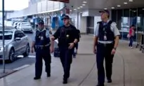 Australian Man Charged After He Coughed and Spat at Police Officers