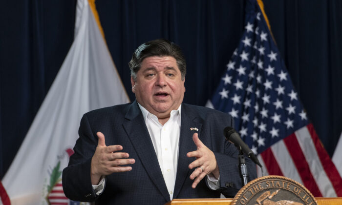 Illinois Gov. J.B. Pritzker gives a daily state update on the coronavirus outbreak in Chicago. (Tyler LaRiviere/Chicago Sun-Times via AP File)