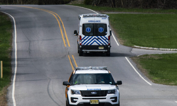 A police car and ambulance in New Jersey in an April 16, 2020, file photograph. (Eduardo Munoz Alvarez/Getty Images)