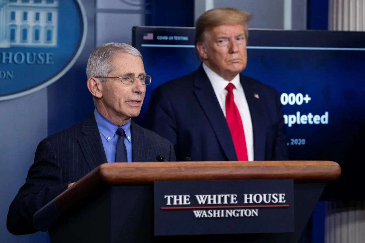 Dr. Anthony Fauci, director of the National Institute of Allergy and Infectious Diseases, about the CCP virus, as President Donald Trump listens, in the James Brady Press Briefing Room of the White House, in Washington, on April 17, 2020. (Alex Brandon/AP Photo)
