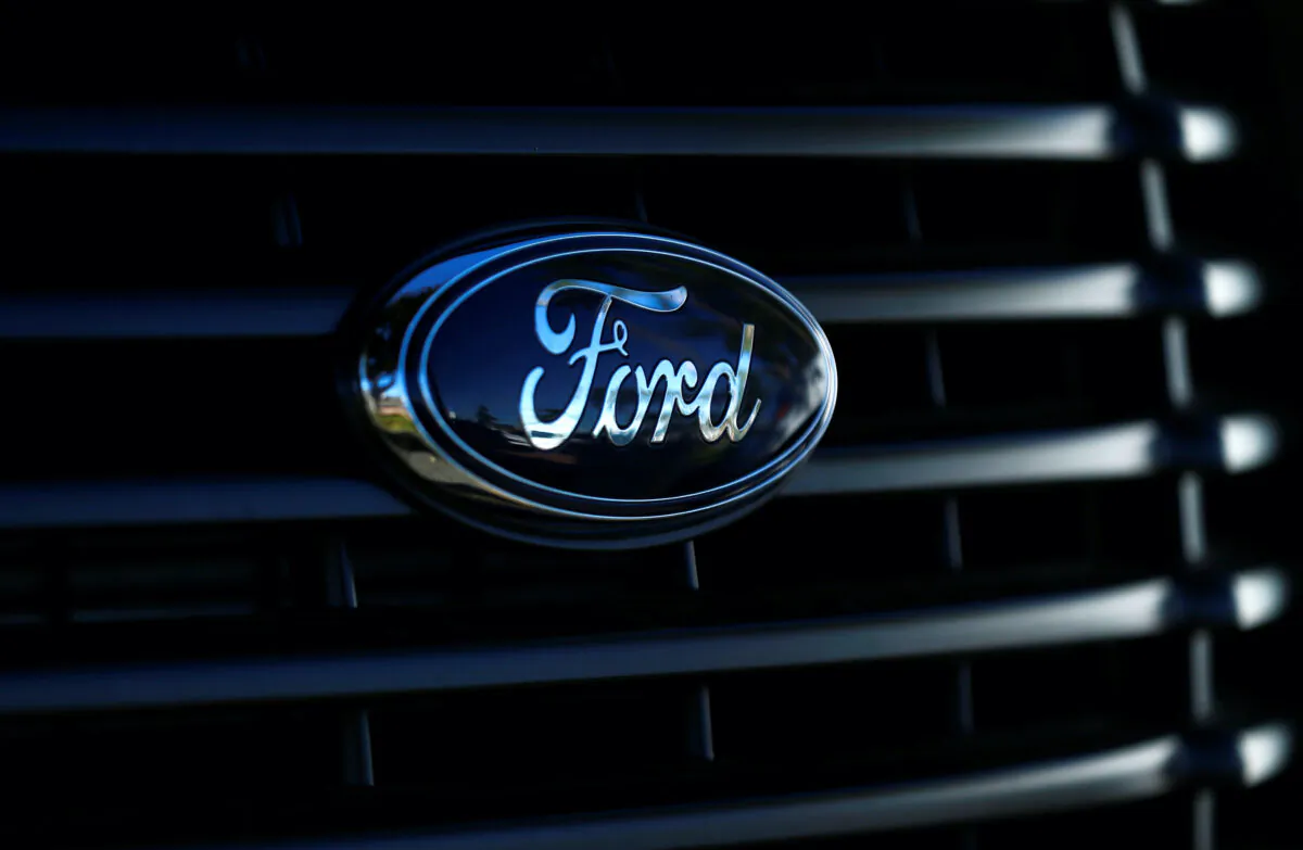 The front grill logo of a Ford pickup truck is seen in this photo taken in Carlsbad, California on Nov. 5, 2014. (Mike Blake/Reuters)