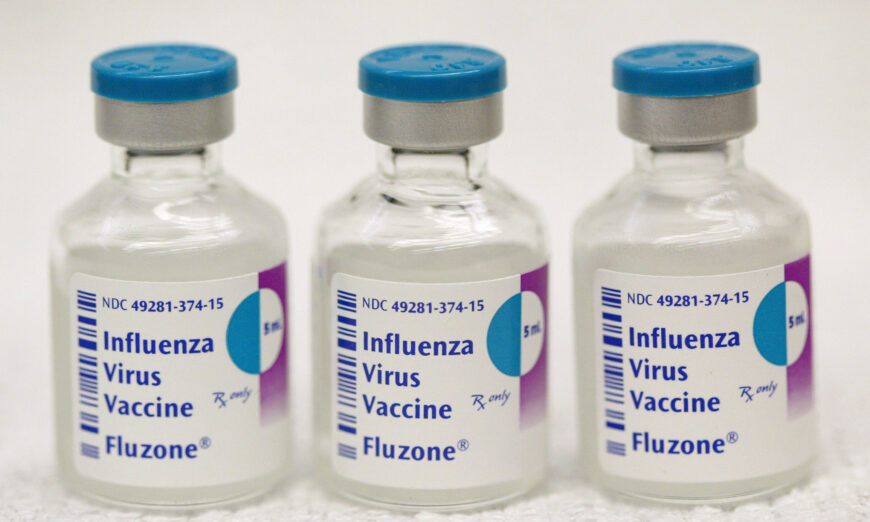 Three 10-dose influenza virus vaccine vials are seen at Ballin Pharmacy in Chicago, Illinois on Oct. 8, 2004. (Tim Boyle/Getty Images)