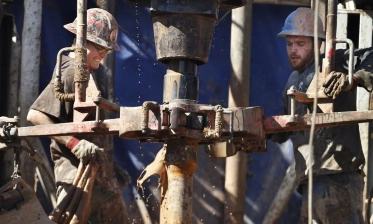 Oil-rig workers drill into the Gypsum Hills near Medicine Lodge, Kansas on Feb. 21, 2012. (AP Photo/Orlin Wagner, File)