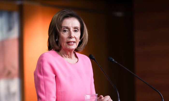 House Speaker Nancy Pelosi (D-Calif.) holds a press conference at the U.S. Capitol in Washington on March 26, 2020. (Charlotte Cuthbertson/The Epoch Times)