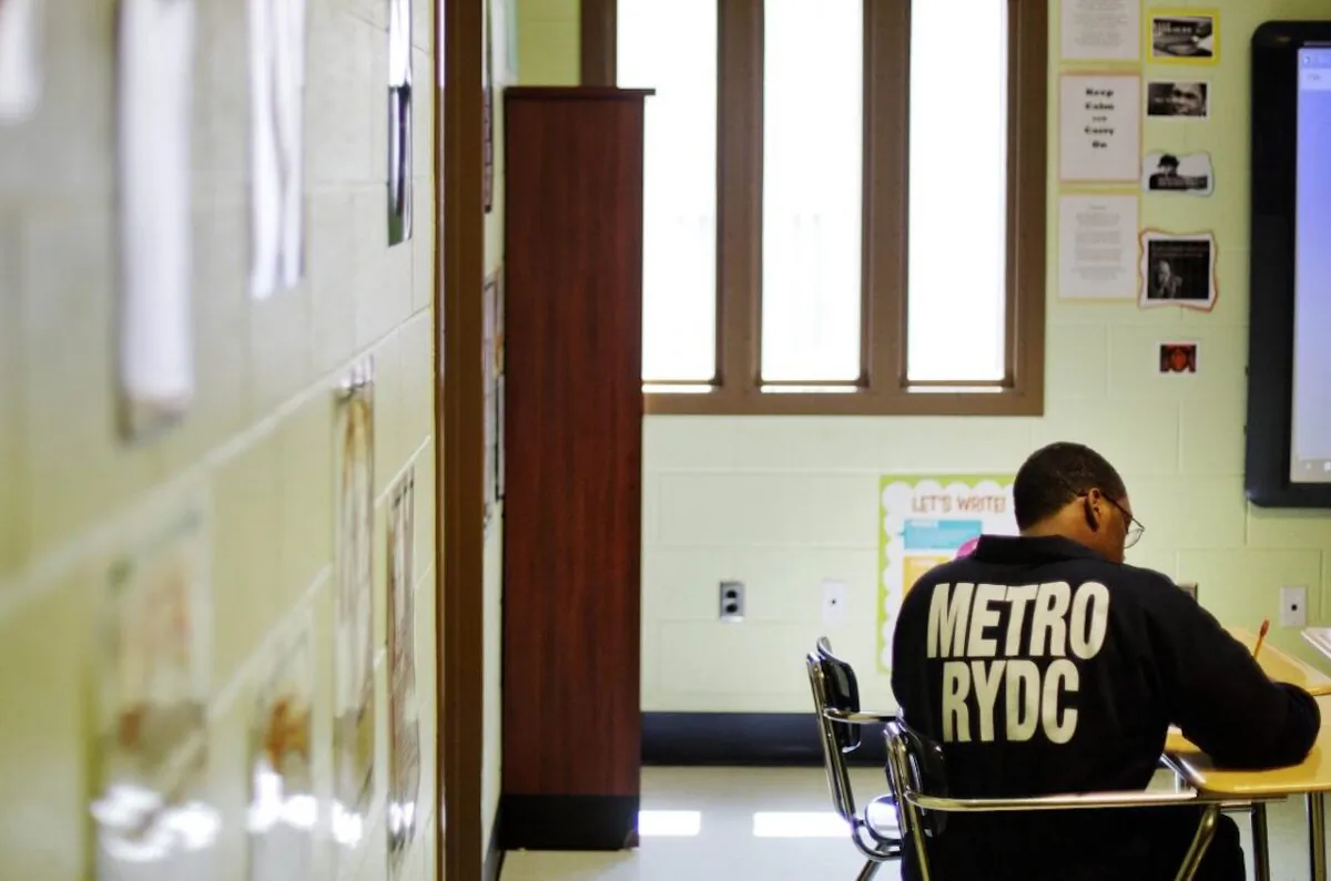 A juvenile resident sits in a classroom at the Georgia Department of Juvenile Justice's Metro Regional Youth Detention Center  in Atlanta, Ga., Aug. 20, 2014. (AP Photo/David Goldman)