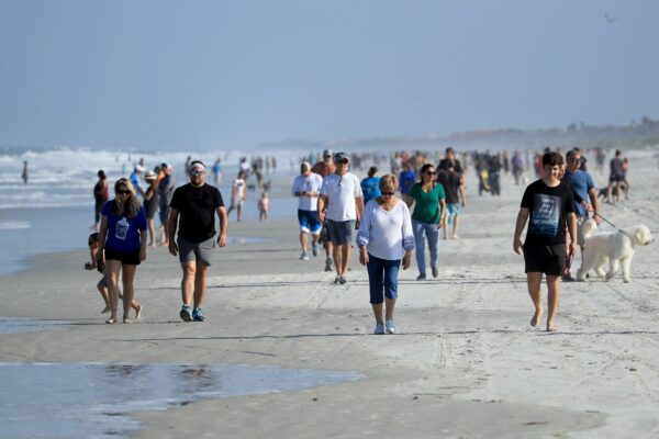 People are seen at the beach in Jacksonville Beach