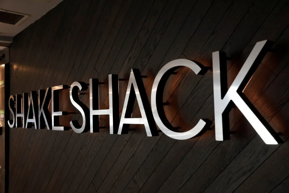 File photo of a logo stands outside of a Shake Shack store in New York, U.S., Sept. 27, 2017. (Lucas Jackson/Reuters)