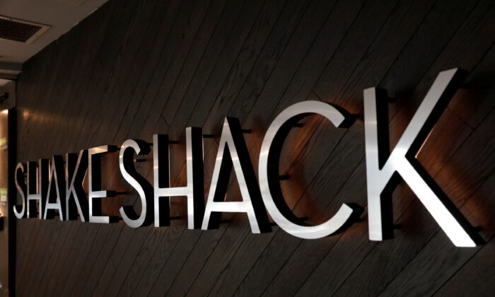File photo of a logo stands outside of a Shake Shack store in New York, U.S., Sept. 27, 2017. (Lucas Jackson/Reuters)