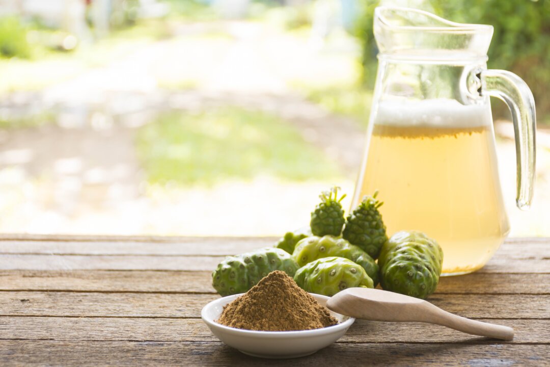 Noni juice was found to have unique properties that could reduce the damage that even just one cigarette a day can do to a person's blood vessels. (Bigbubblebee99/Shutterstock)