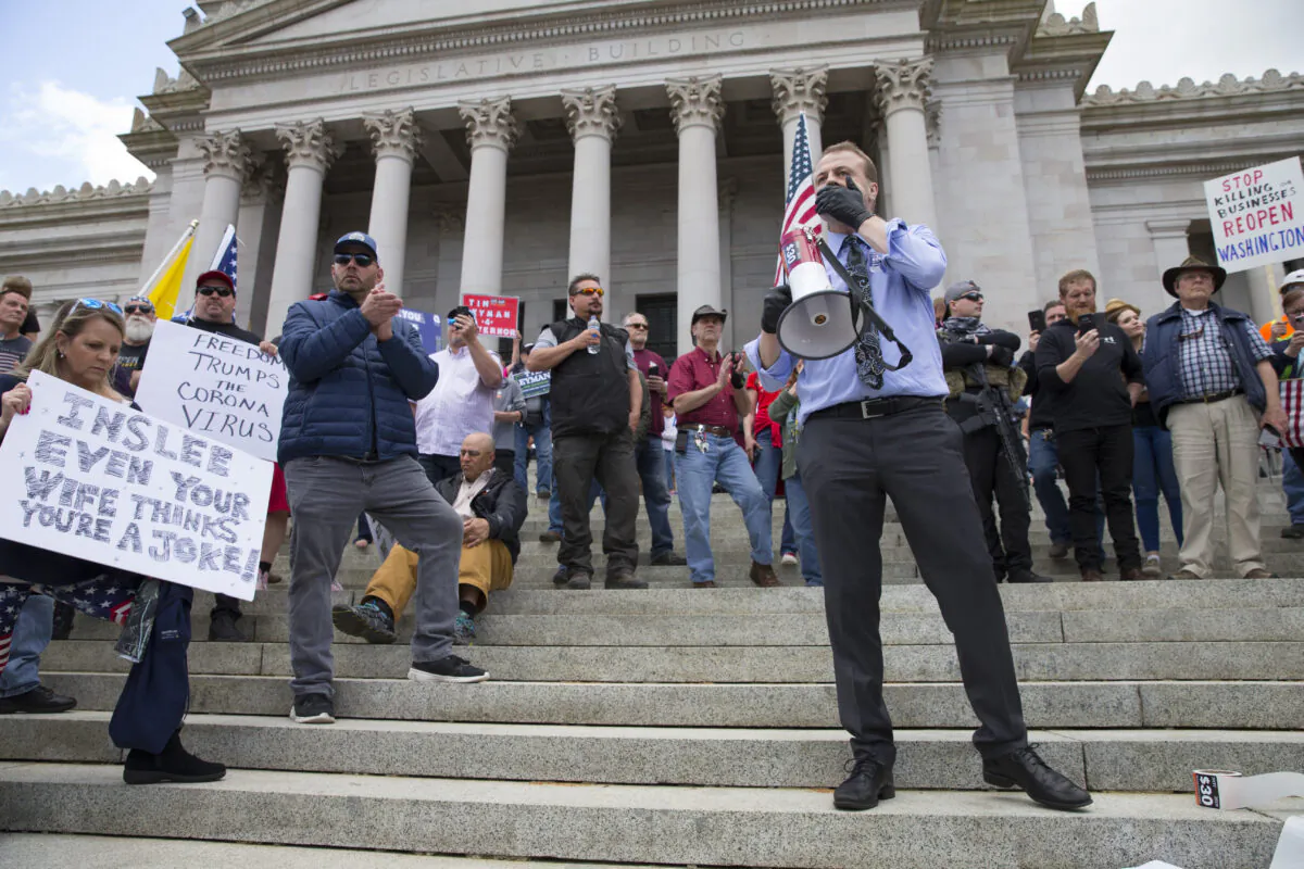 Gubernatorial candidate and anti-tax activist, Tim Eyman, speaks during a 'Hazardous Liberty! Defend the Constitution!' rally to protest the stay-at-home order, at the Capitol building in Olympia, Wash., on April 19, 2020. (Karen Ducey/Getty Images)