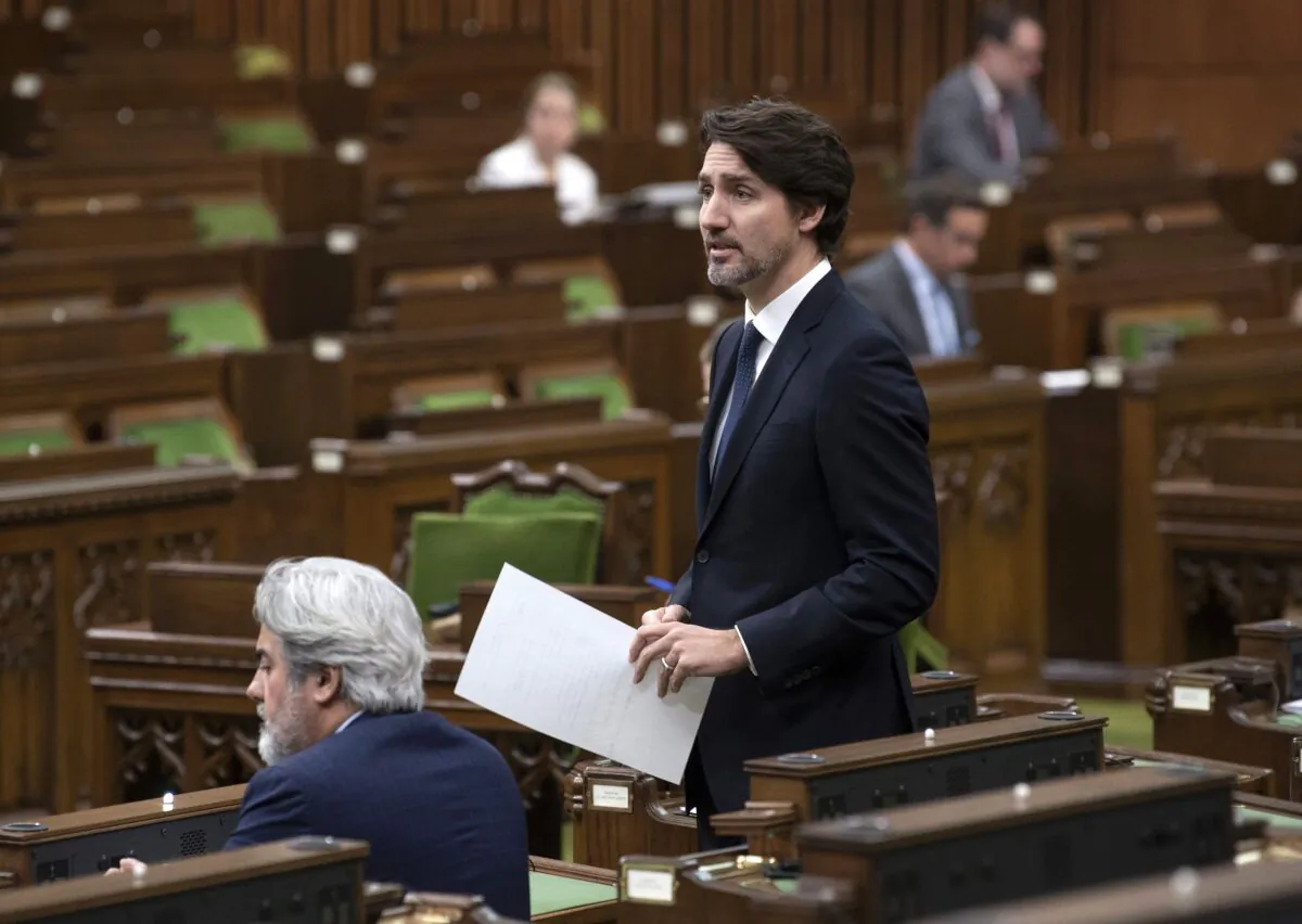 Prime Minister Justin Trudeau speaks during question period in the House of Commons on April 20, 2020. A small number of MPs are to convene for a once−a−week, in−person sitting of the House of Commons today. (The Canadian Press/Adrian Wyld)