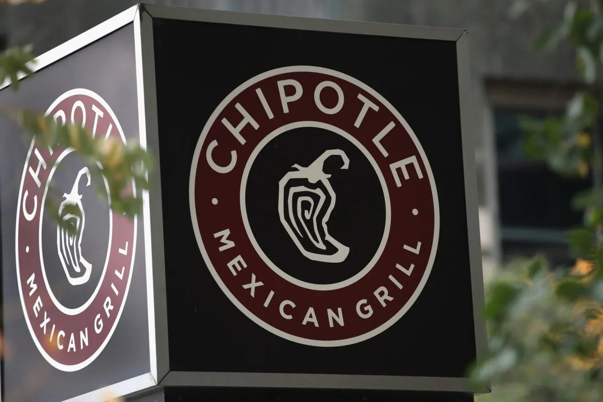 A sign marks the location of a Chipotle restaurant in Chicago, on Oct. 25, 2017. (Scott Olson/Getty Images)