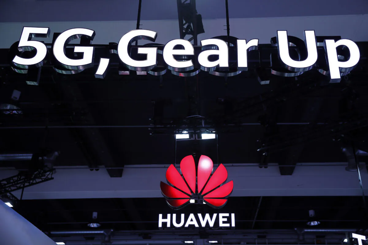 Huawei and 5G signs on display during the 10th Global Mobile Broadband Forum hosted by Chinese tech giant Huawei in Zurich, Switzerland, on Oct. 15, 2019. (Stefan Wermuth/AFP via Getty Images)