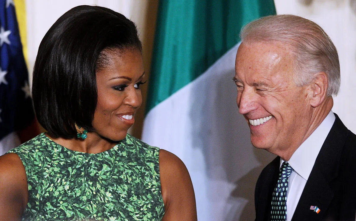 First Lady Michelle Obama and Vice President Joe Biden attend a St. Patrick's Day reception in the East Room of the White House in Washington on March 17, 2011. (Olivier Douliery-Pool/Getty Images)