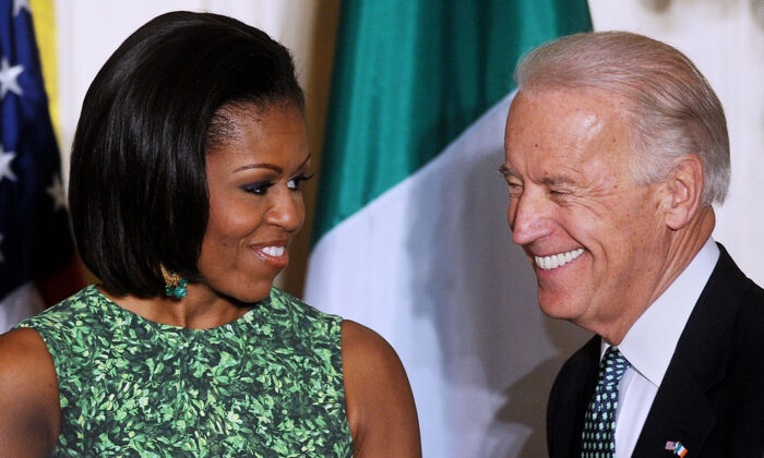 First Lady Michelle Obama and Vice President Joe Biden attend a St. Patrick's Day reception in the East Room of the White House in Washington on March 17, 2011. (Olivier Douliery-Pool/Getty Images)