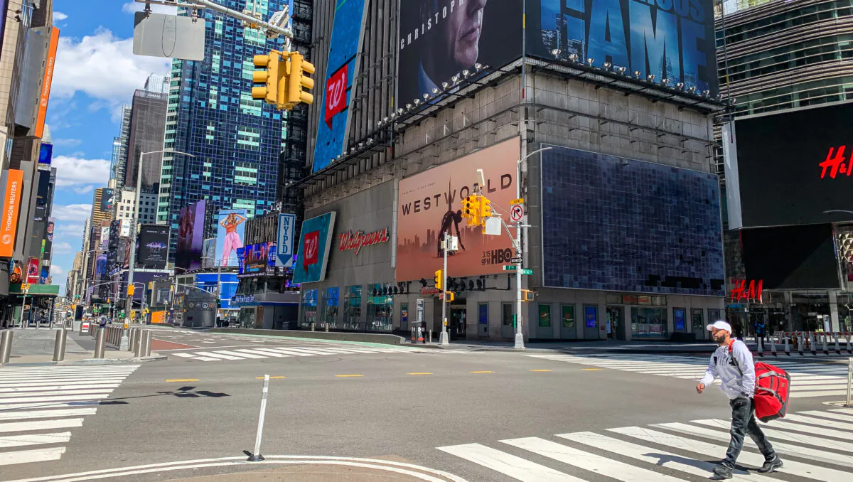 The nearly empty street view outside Times Square subway station in New York on April 15, 2020. (Chung I Ho/The Epoch Times)