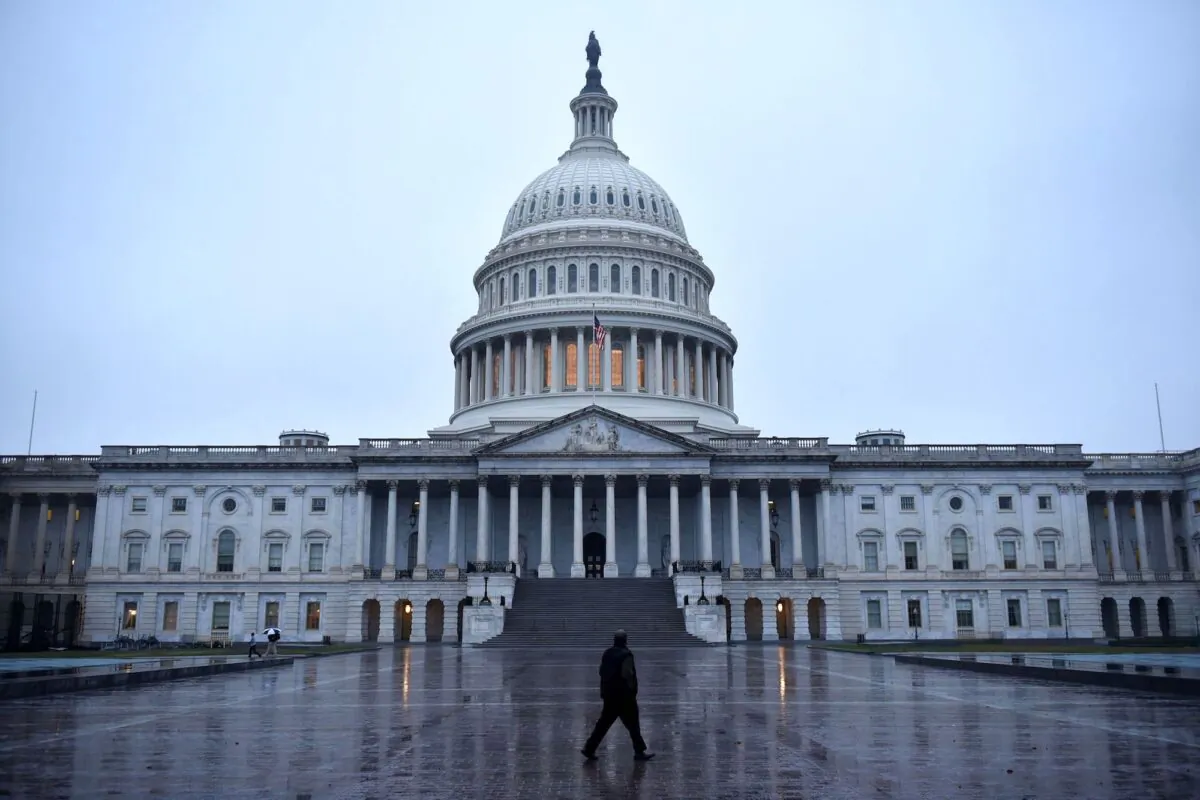 A man walks in front of the U.S. Capitol, in Washington, on Nov. 6, 2018. (Mandel Ngan/AFP/Getty Images)