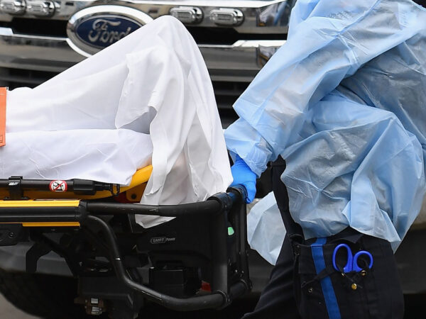 Medical staff move a patient into the Wyckoff Heights Medical Center emergency room