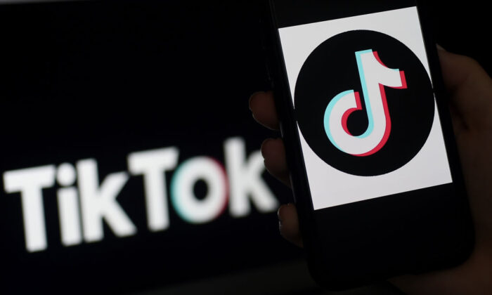 TikTok logo is displayed on the screen of an iPhone in Arlington, Virginia, on April 13, 2020. (Olivier Douliery/AFP via Getty Images)