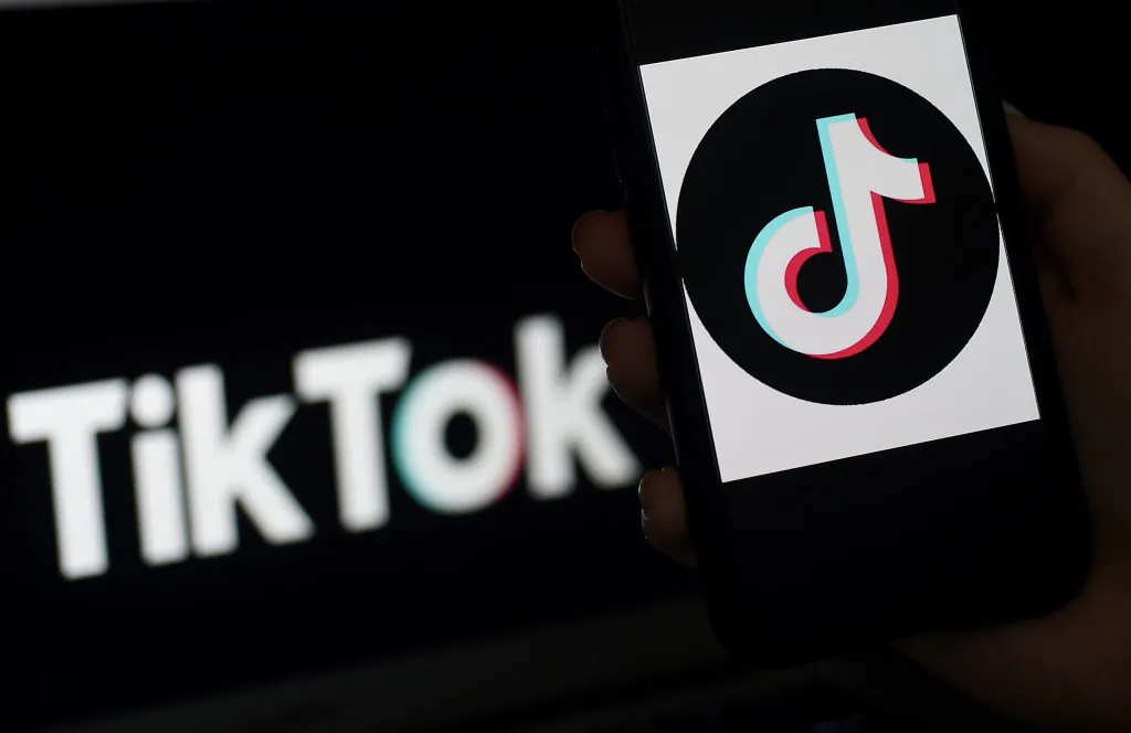 TikTok logo is displayed on the screen of an iPhone in Arlington, Virginia, on April 13, 2020. (Olivier Douliery/AFP via Getty Images)