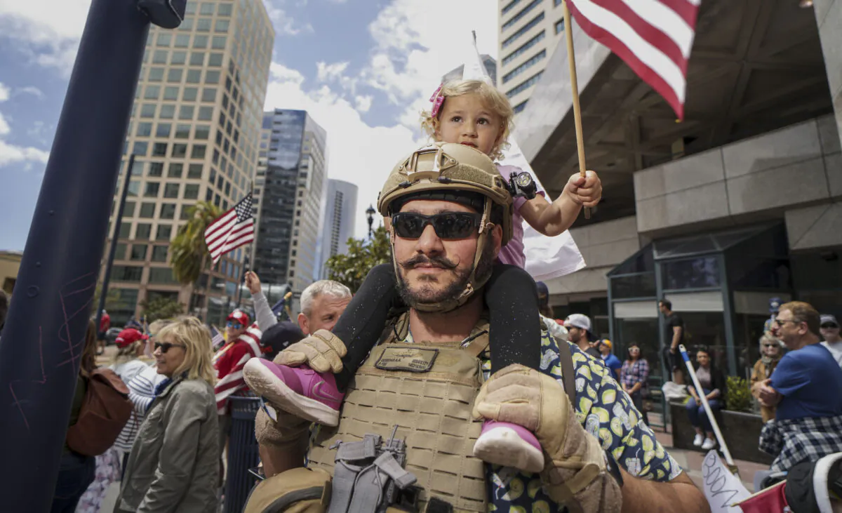 Demonstrators protest during a "Freedom Rally" against Stay-At-Home Directives in San Diego, California, on April 18, 2020. (Sandy Huffaker/Getty Images)