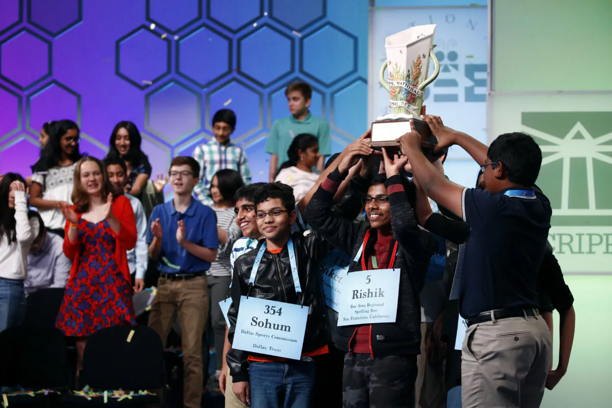 Eight co-champions celebrate after winning the Scripps National Spelling Bee, in National Harbor, Md., on May 31, 2019. (Patrick Semansky/AP)