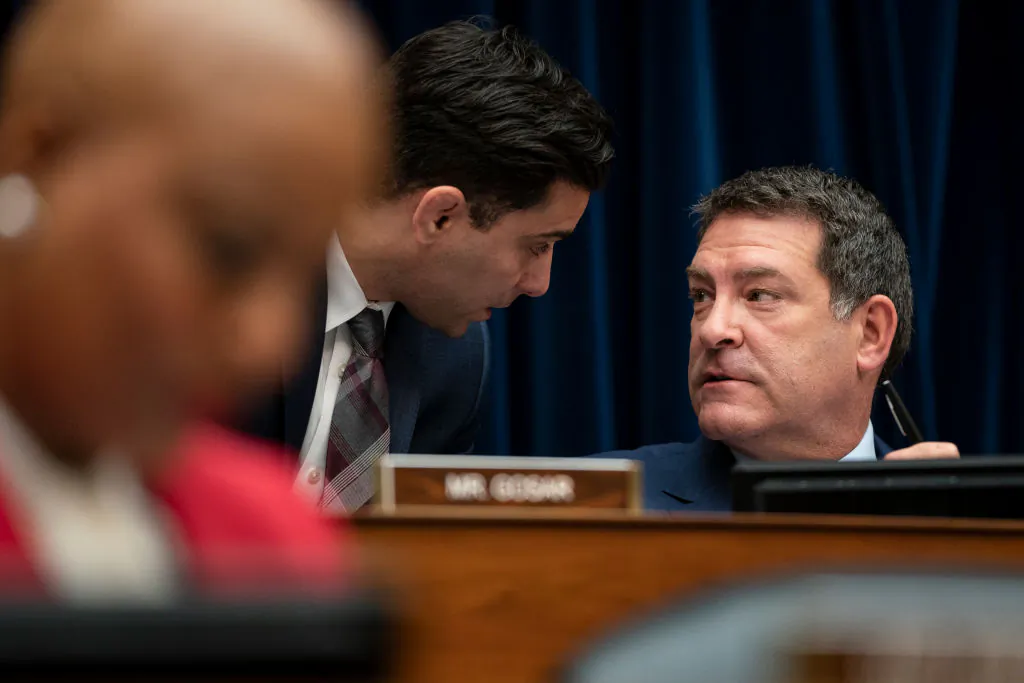 U.S. Rep. Mark Green (R-Tenn.) confers with an aide during a House Oversight and Reform Committee hearing, in the Rayburn House Office Building on Capitol Hill in Washington, on March 11, 2020. (Drew Angerer/Getty Images)