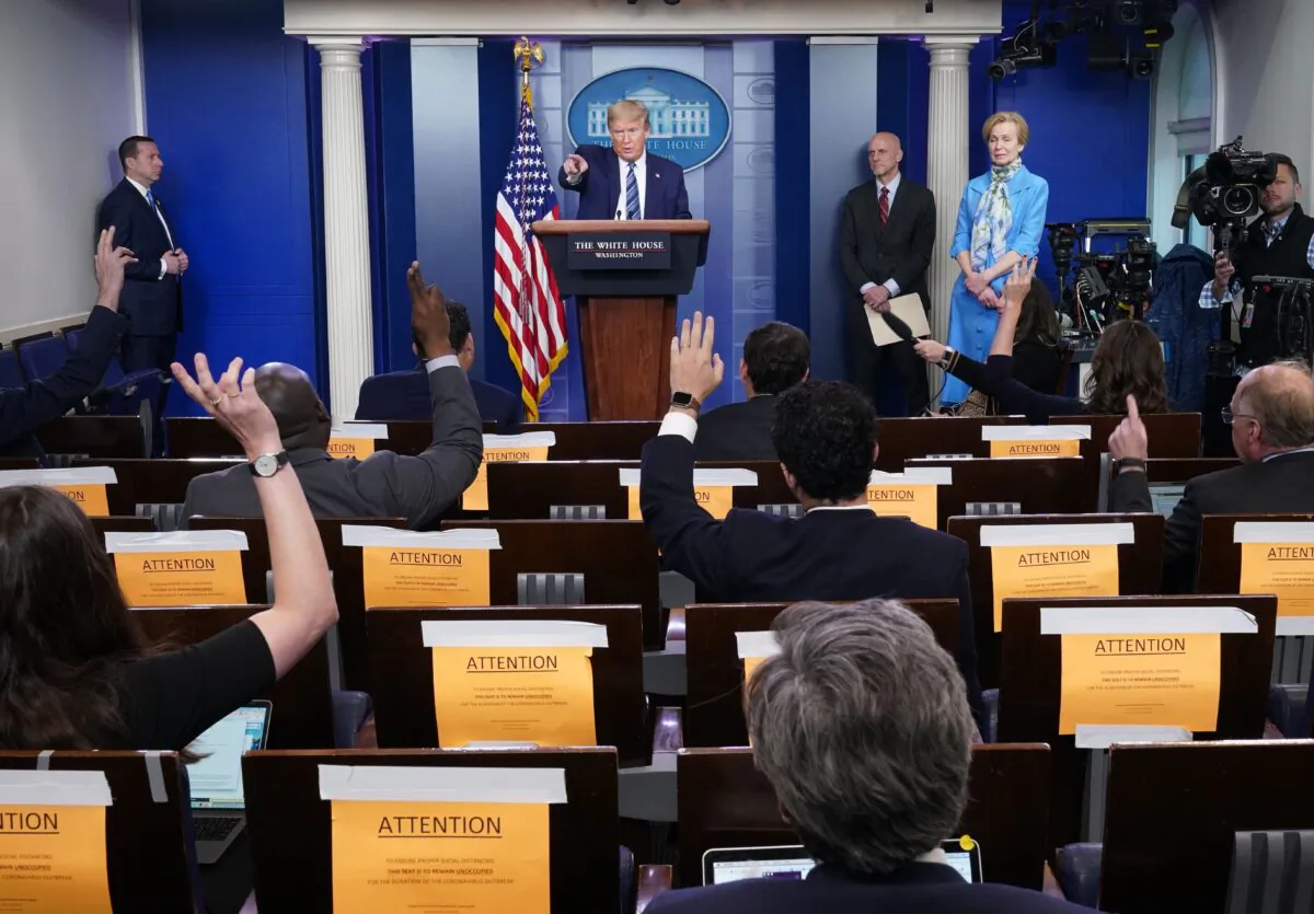 President Donald Trump answers questions from the media during a daily briefing on the CCP virus in the Brady Briefing Room of the White House on April 21, 2020. (Mandel Ngan/AFP via Getty Images)