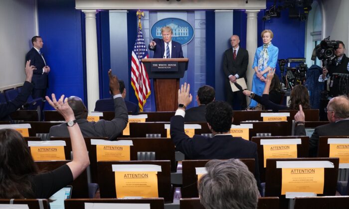 President Donald Trump answers questions from the media during a daily briefing on the CCP virus in the Brady Briefing Room of the White House on April 21, 2020. (Mandel Ngan/AFP via Getty Images)