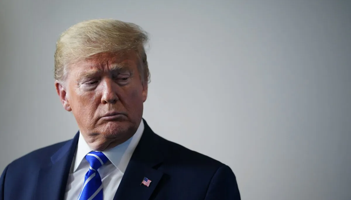 U.S. President Donald Trump listens to a speaker during the daily briefing on the novel coronavirus, which causes COVID-19, in the Brady Briefing Room of the White House in Washington on April 23, 2020. (Mandel Ngan/AFP via Getty Images)