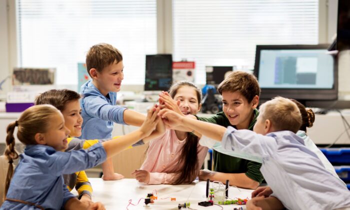 Anyone who thinks it’s possible to keep students six feet apart throughout the school day has no understanding of what children are like when they are together. (Syda Productions/Shutterstock)