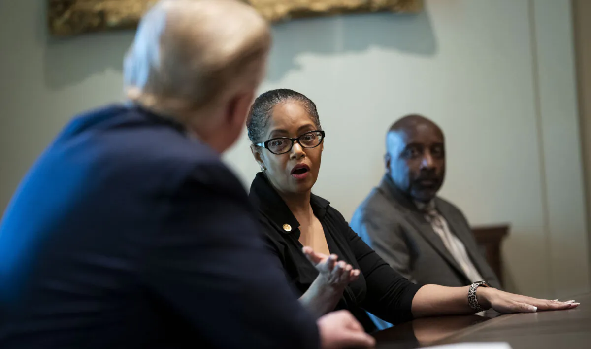 State Rep. Karen Whitsett of Michigan speaks with President Donald Trump at the White House in Washington on April 14, 2020. (Doug Mills-Pool/Getty Images)