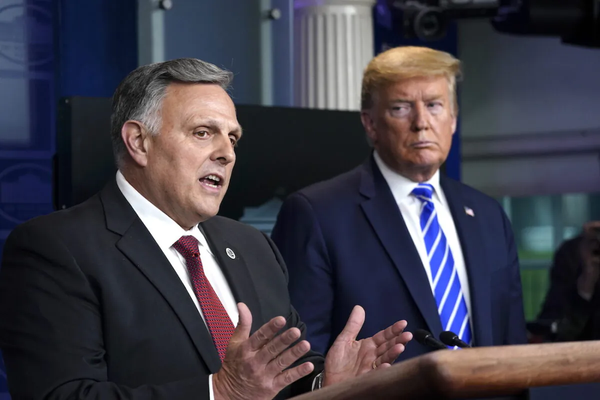 William Bryan, head of science and technology at the Department of Homeland Security speaks while President Donald Trump listens during a daily CCP virus briefing at the White House in Washington on April 23, 2020. (Drew Angerer/Getty Images)