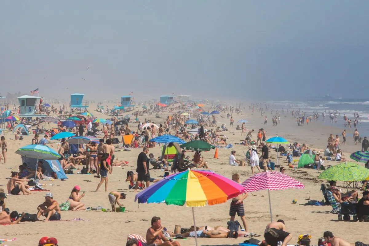 People enjoy the beach amid the COVID-19 pandemic in Huntington Beach, Calif., on April 25, 2020. (Apu Gomes/AFP via Getty Images)
