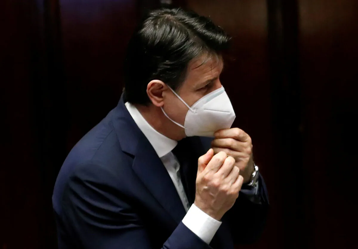 Italian Prime Minister Giuseppe Conte wears a face mask as he attends a session of the lower house of parliament on the CCP virus in Rome, Italy on April 21, 2020. (Remo Casilli/Reuters)