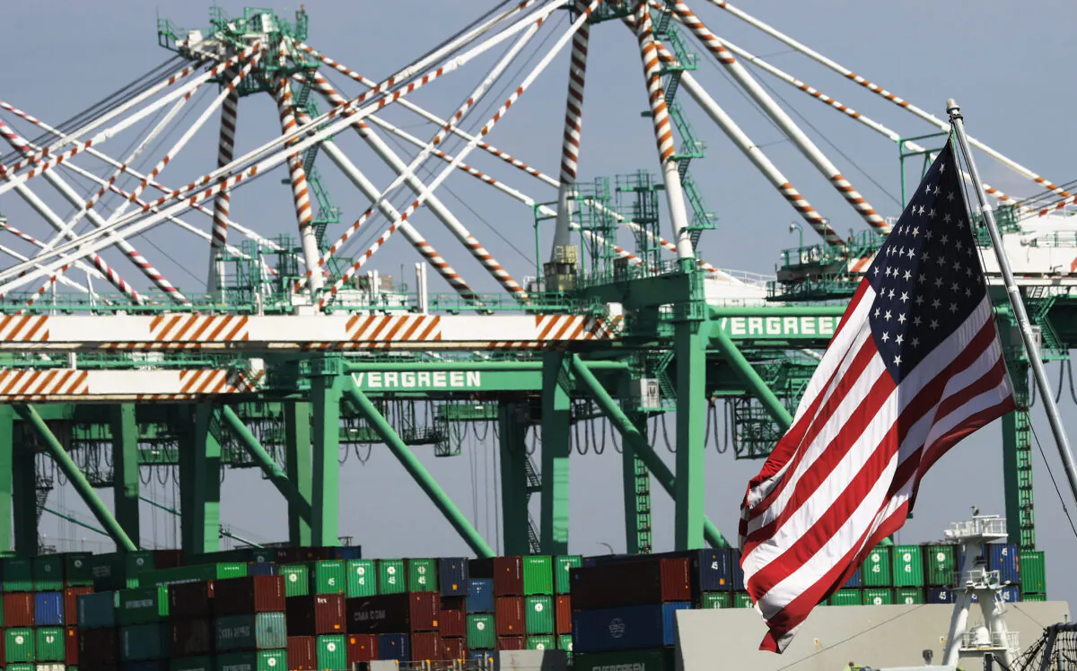 Cranes stand above shipping containers at the Port of Los Angeles, which is the nation's busiest container port in Terminal Island, Calif., on March 6, 2020. (Mario Tama/Getty Images)