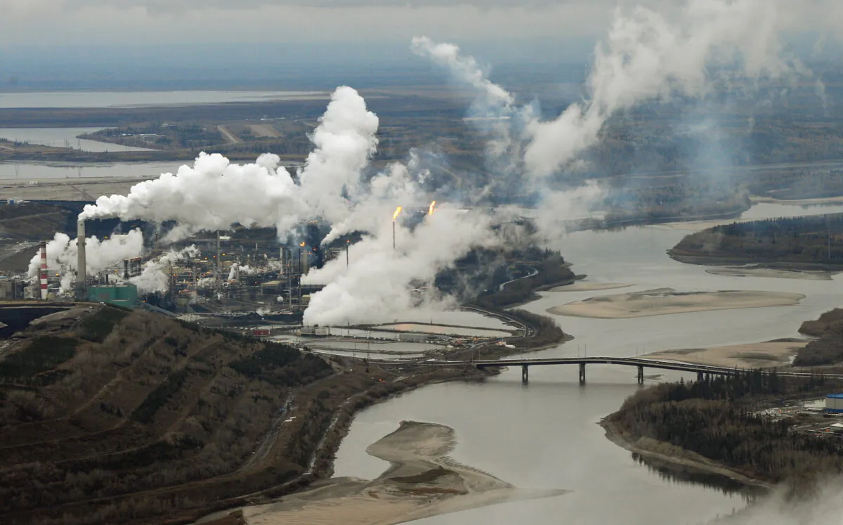 Aerial view of the Suncor oil sands extraction facility on the banks of the Athabasca River and near the town of Fort McMurray in Alberta Province, Canada, on Oct. 23, 2009. (Mark Ralston /AFP Photo/AFP via Getty Images)