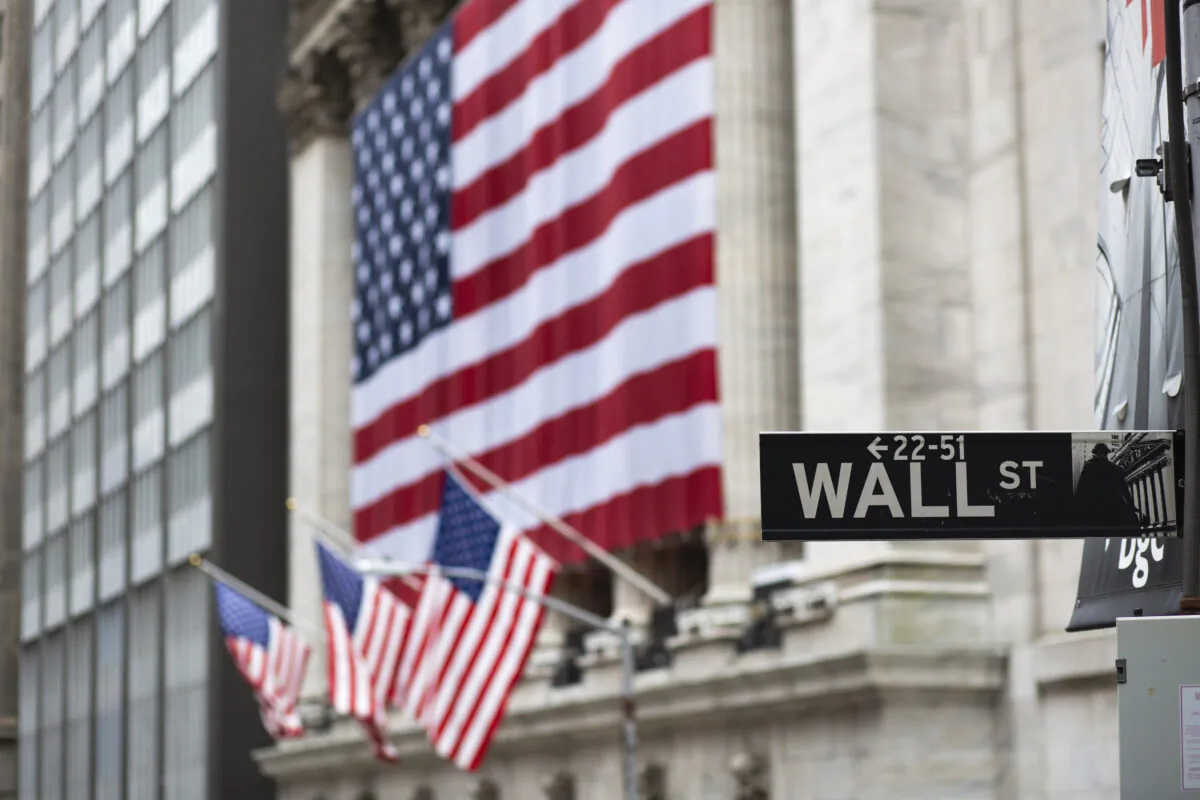 Flags fly at full staff outside the NYSE in New York City on April 9, 2020. (Kena Betancur/Getty Images)