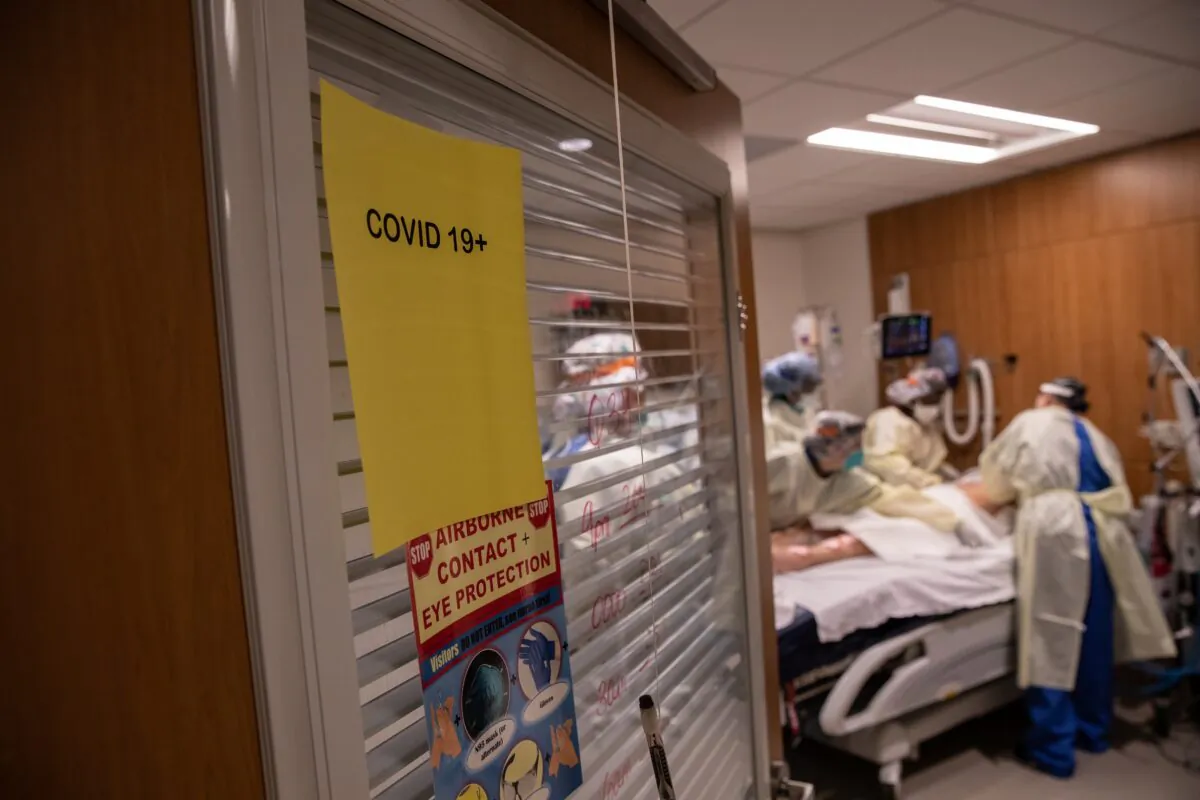 A team works on a COVID-19 patient at Stamford Hospital in Connecticut on April 24, 2020. (John Moore/Getty Images)
