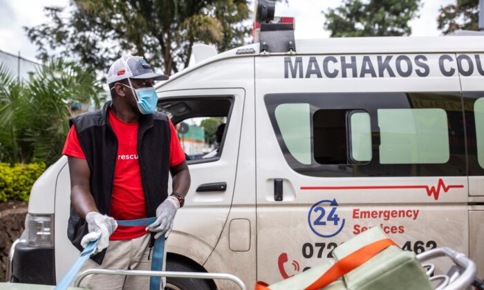 A file photo of an ambulance operator at Kenyatta National Hospital in Nairobi, on April 17, 2020. (Patrick Meinhardt/AFP via Getty Images)